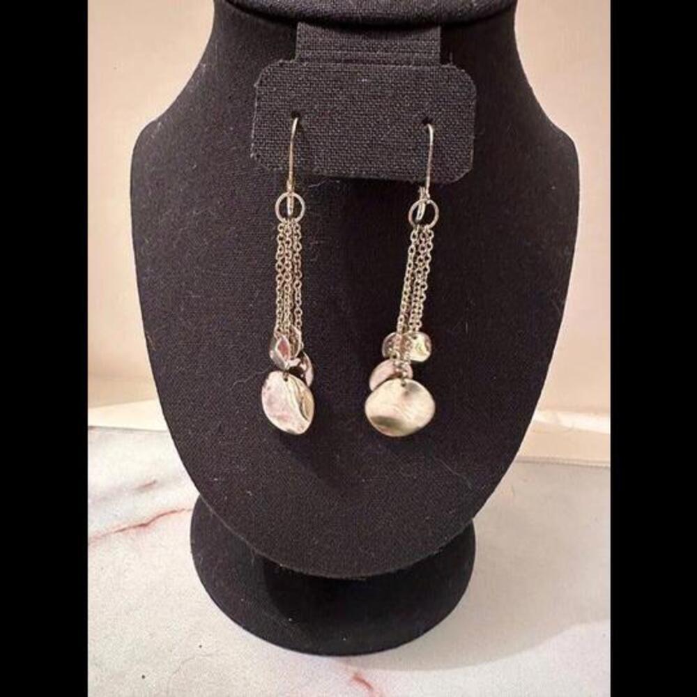 Elevate Your Elegance with Cute Silver Dangling Earrings!